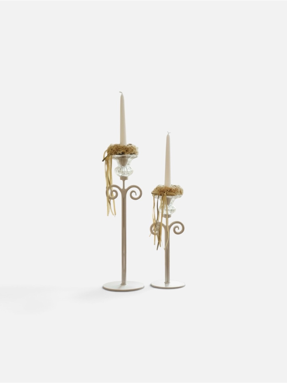 Two lovely white farmhouse candlesticks.